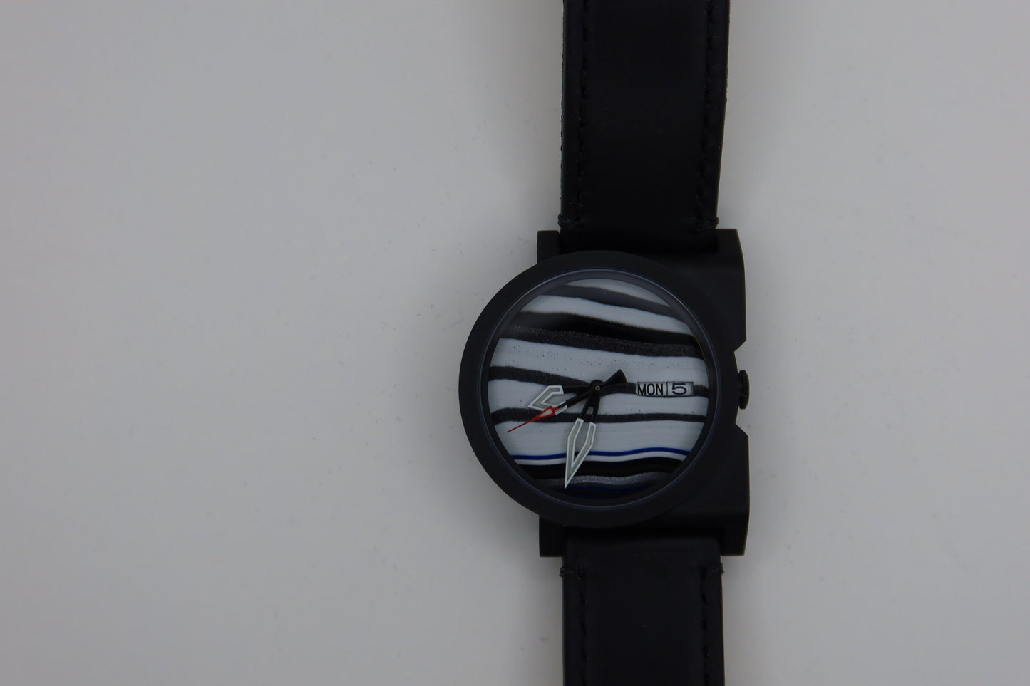 Black and white NH38 powered watch in Ando case