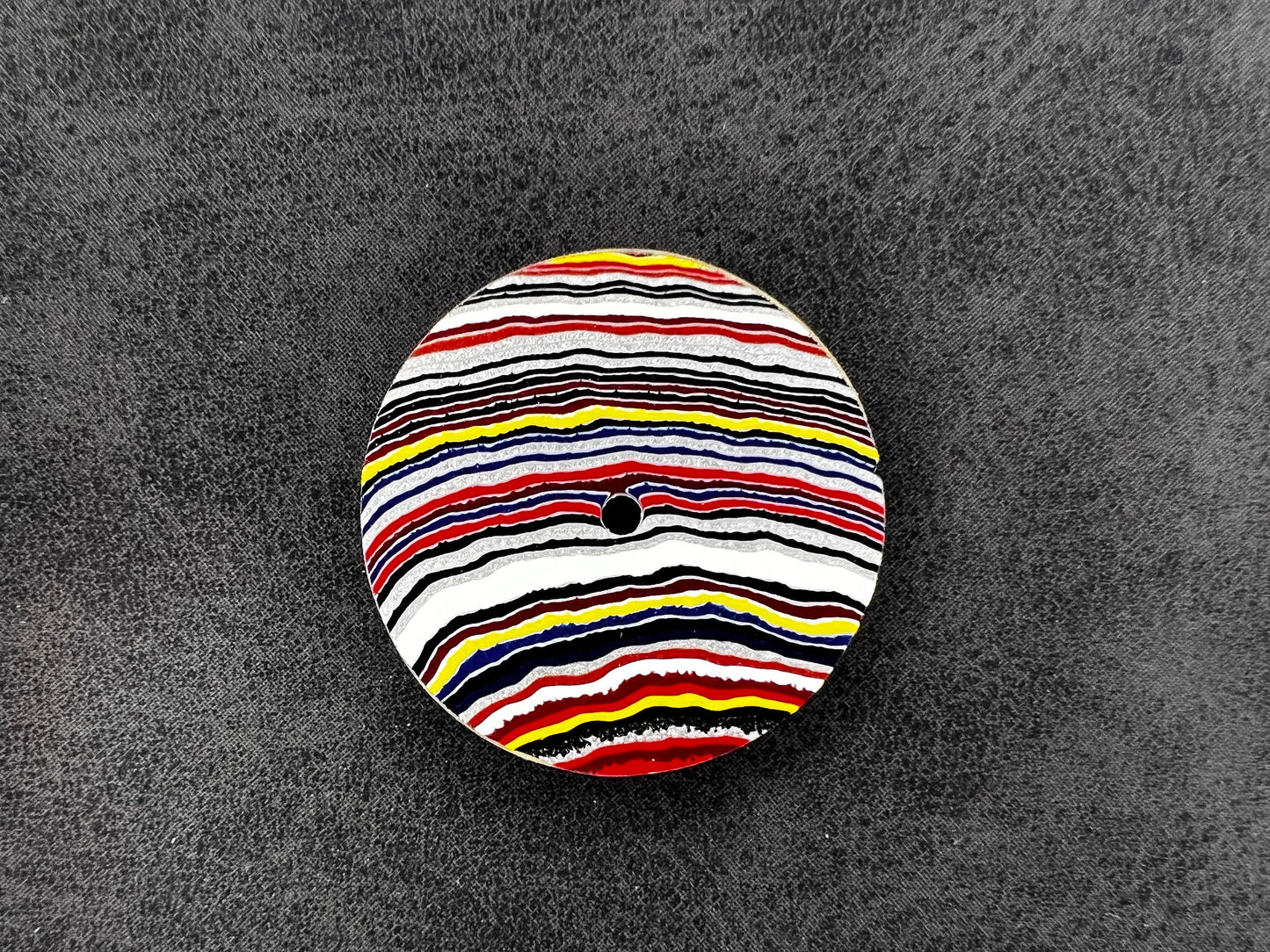 Bright linear fordite NH38 dial