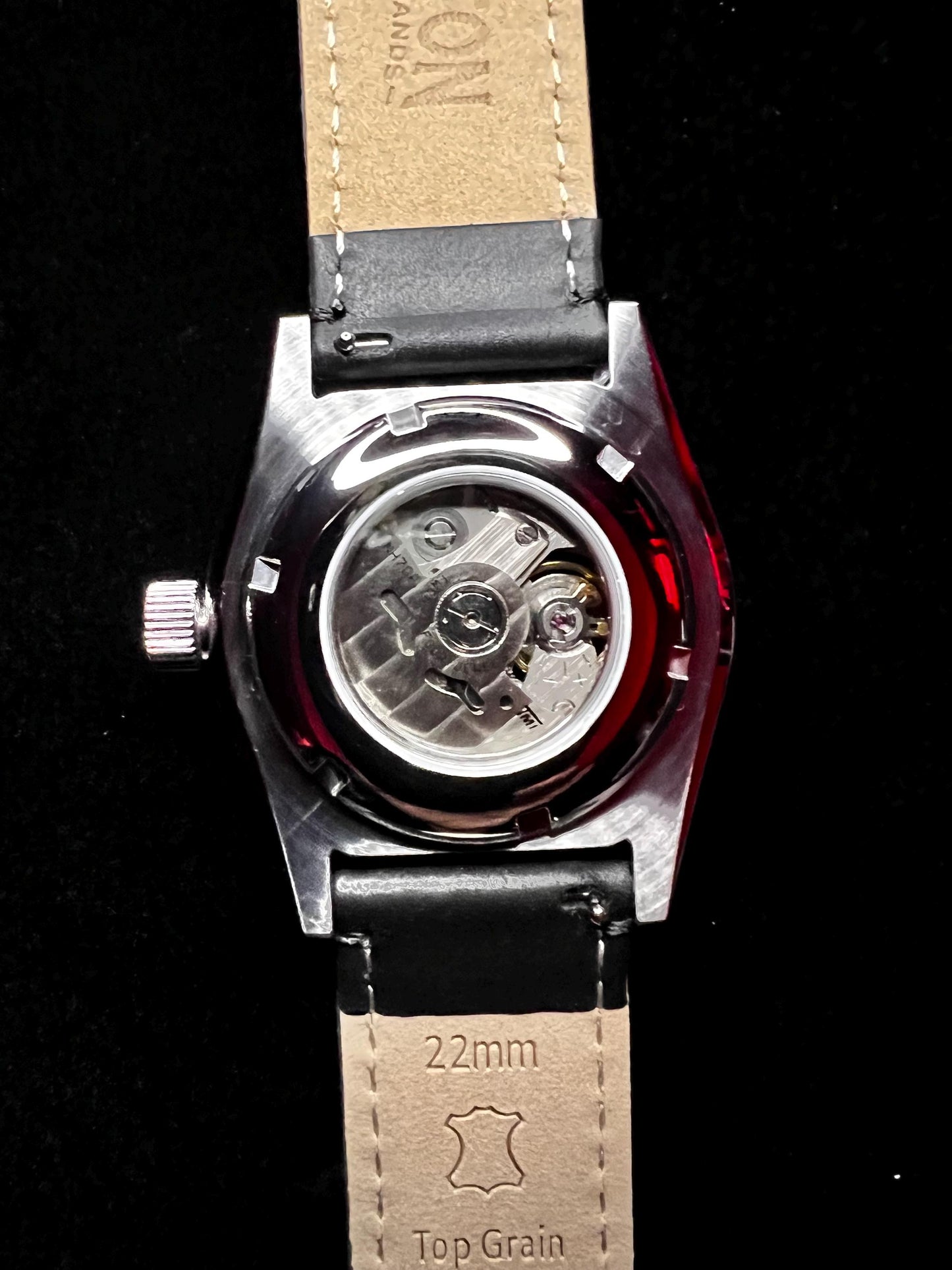 Watch with Skeletonized fordite dial (NH70 powered)