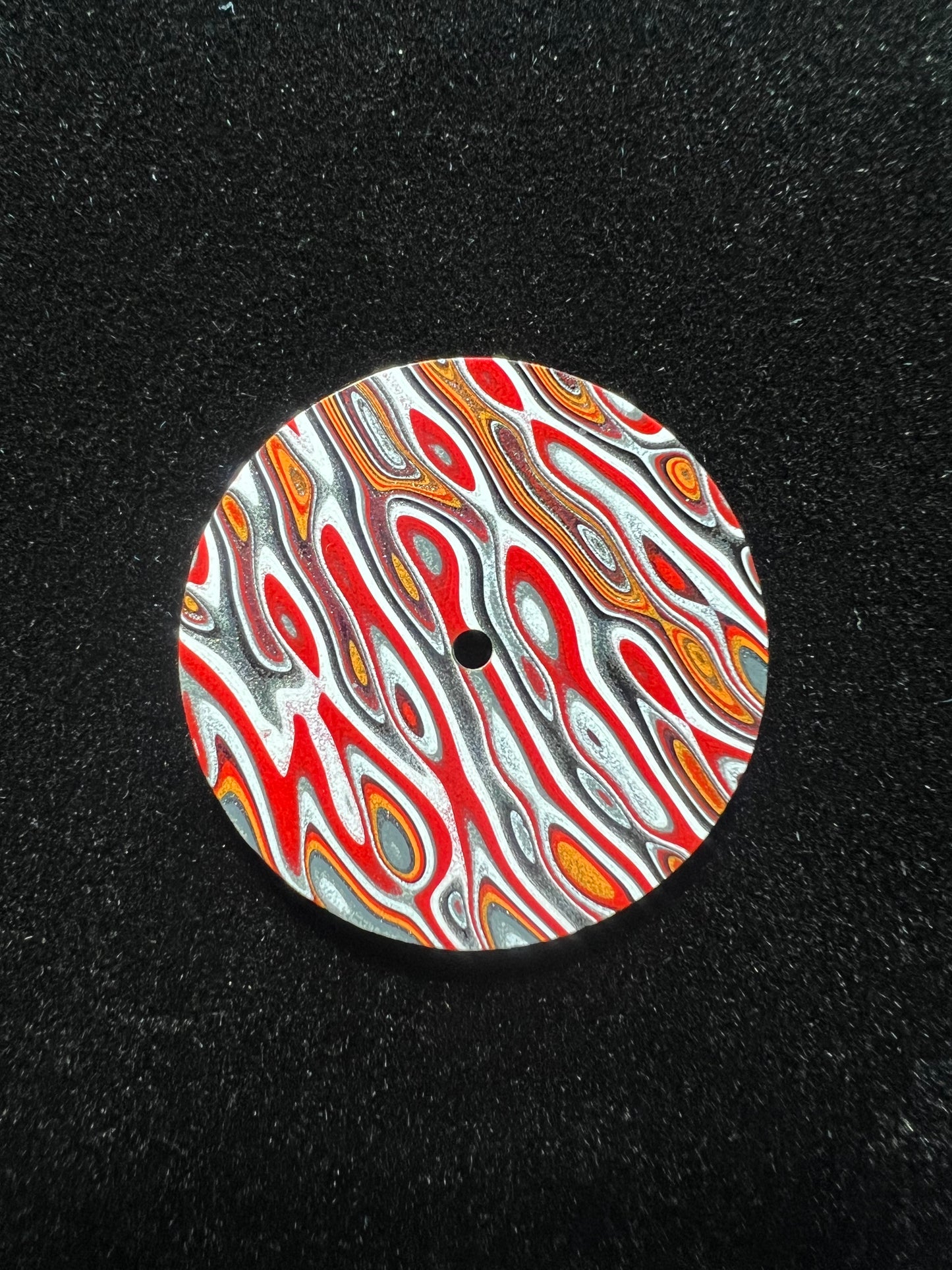 Eye catching fordite dial