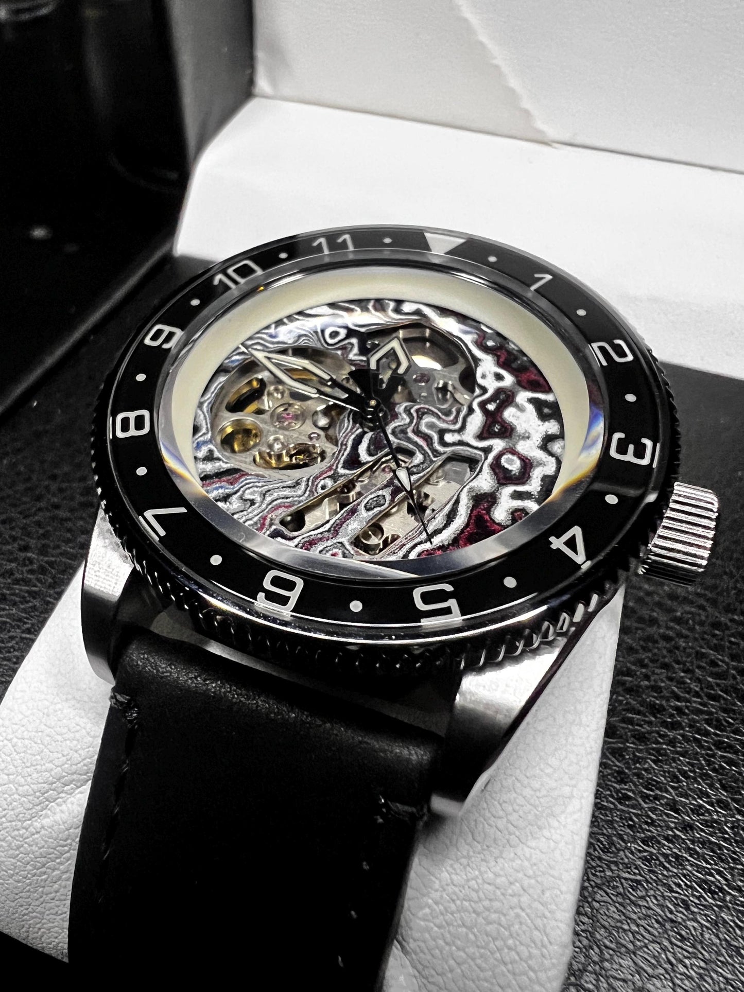 Watch with Skeletonized fordite dial (NH70 powered)
