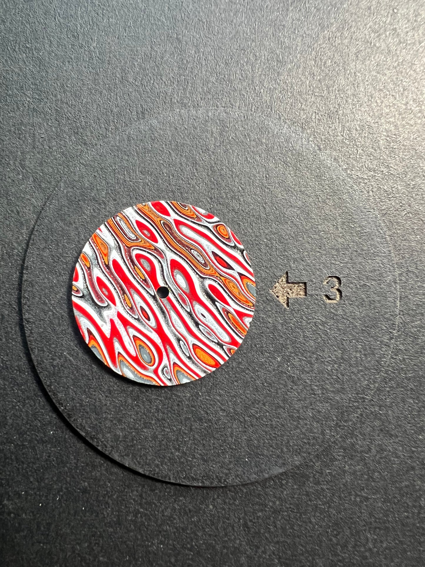 Eye catching fordite dial
