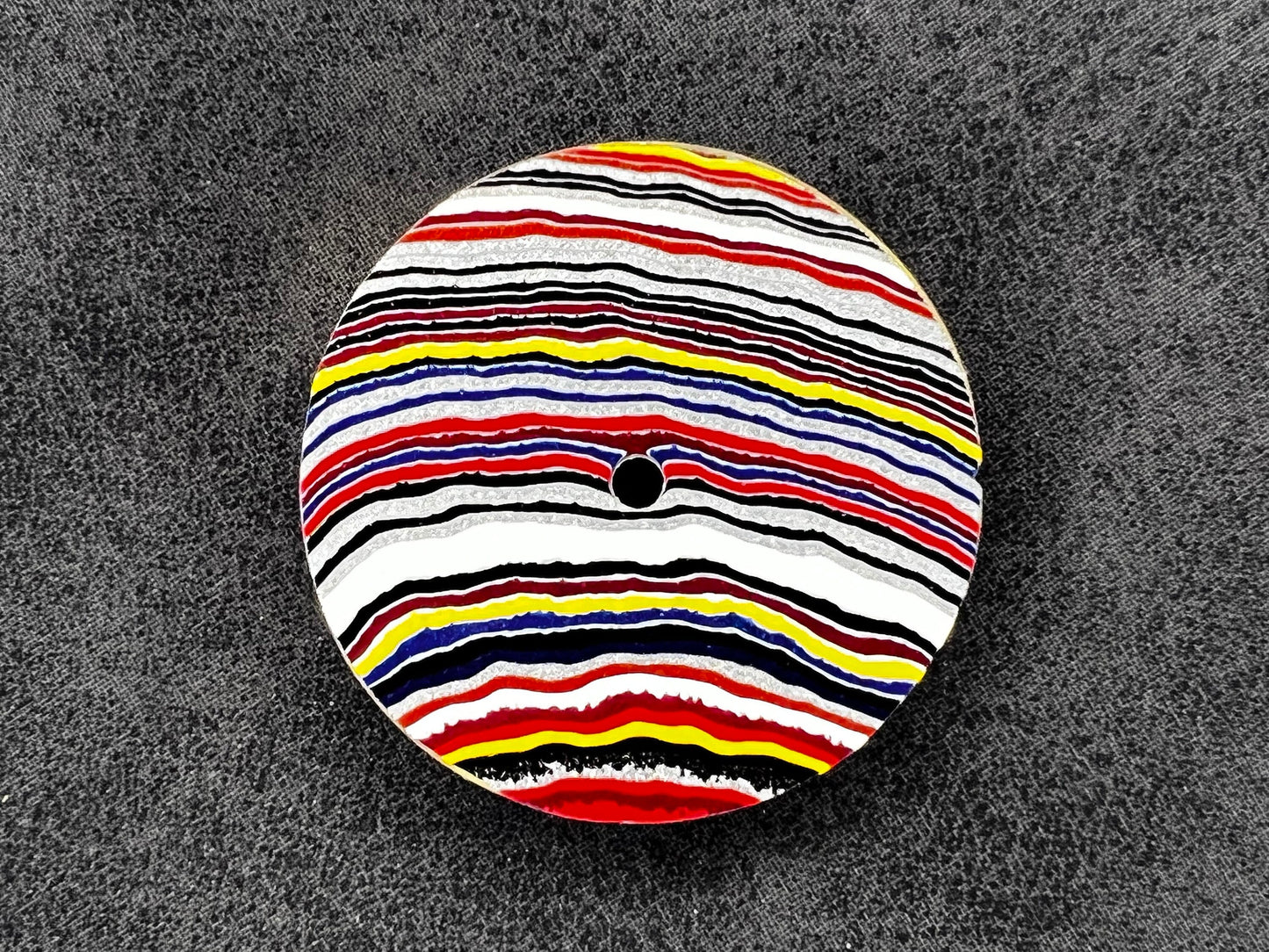 Bright linear fordite NH38 dial