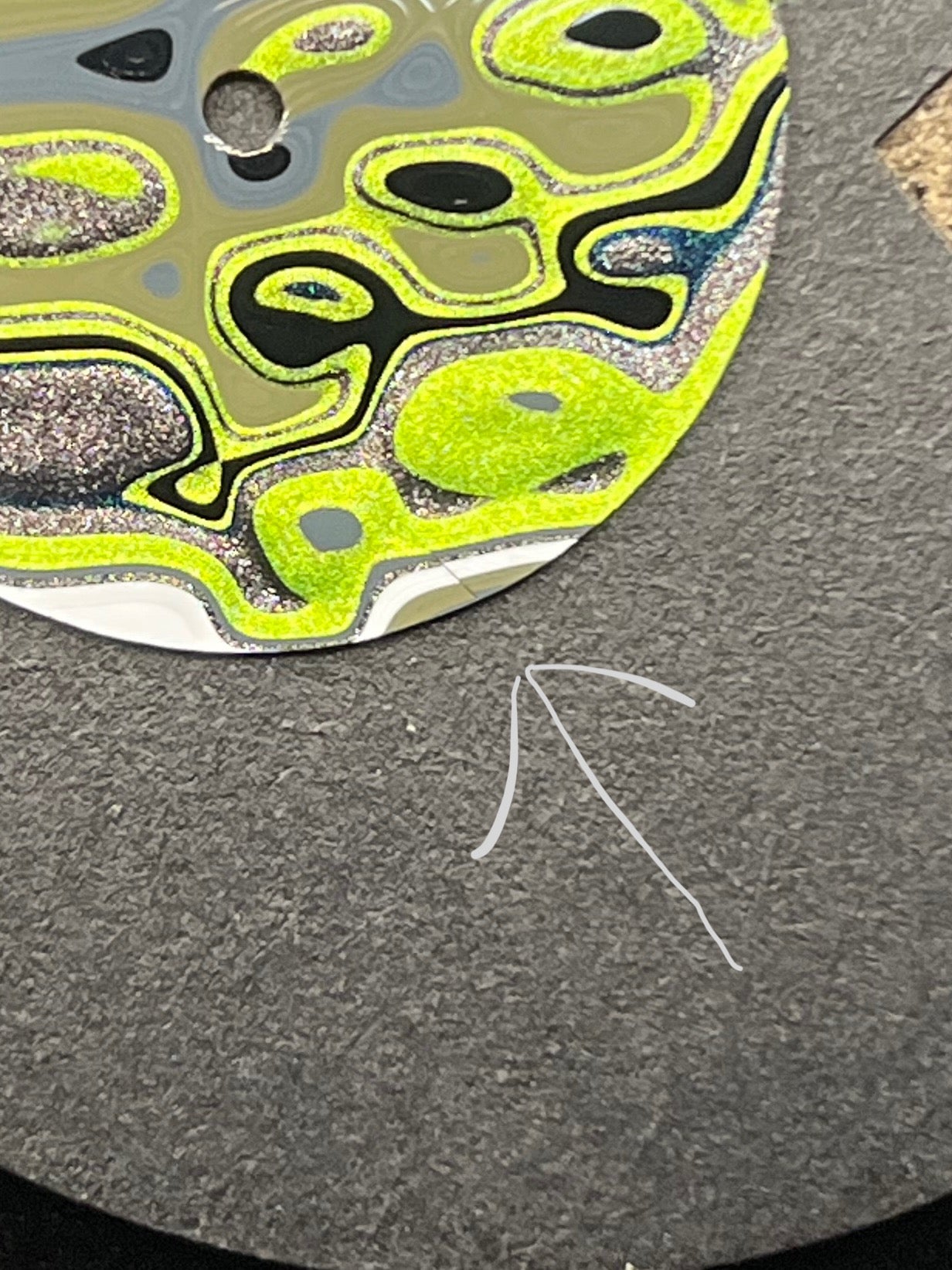 Handmade fordite dial with small defect