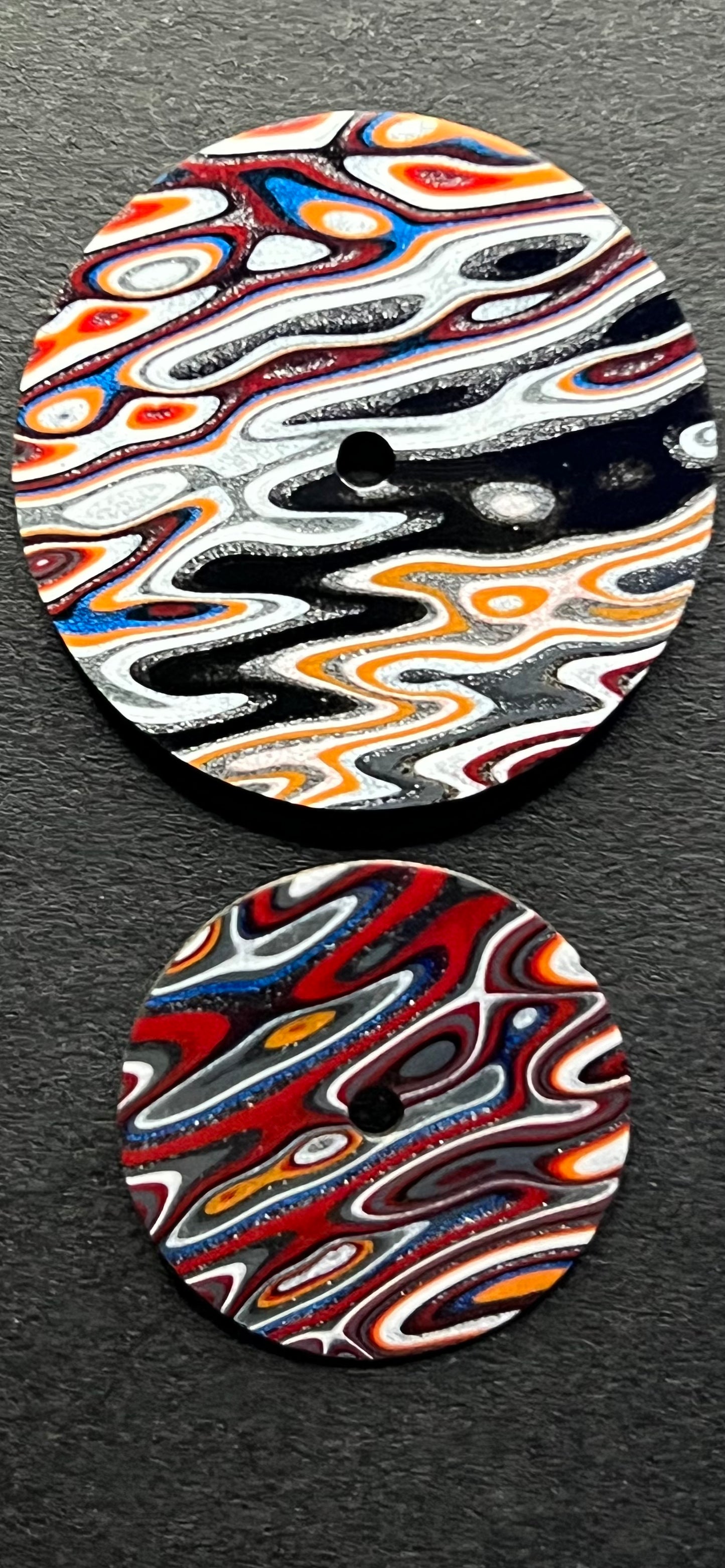 Matching pair of fordite dials for A.H.