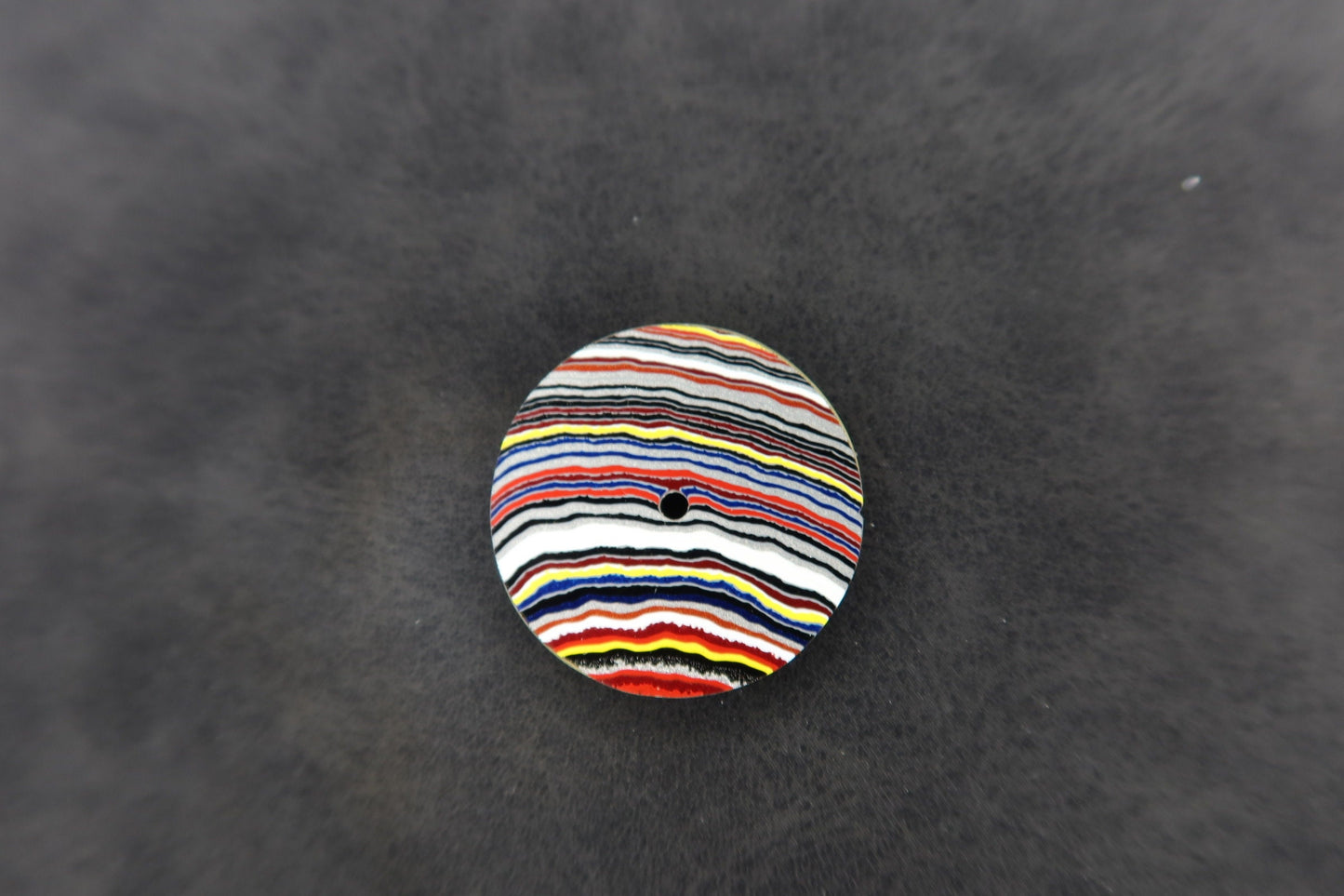Bright linear fordite NH38 dial
