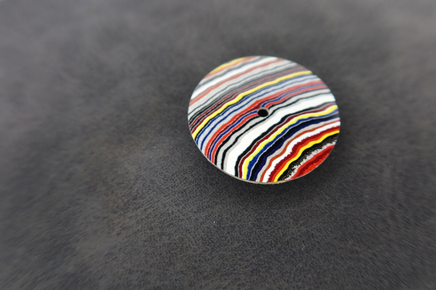 Bright linear fordite NH38 dial