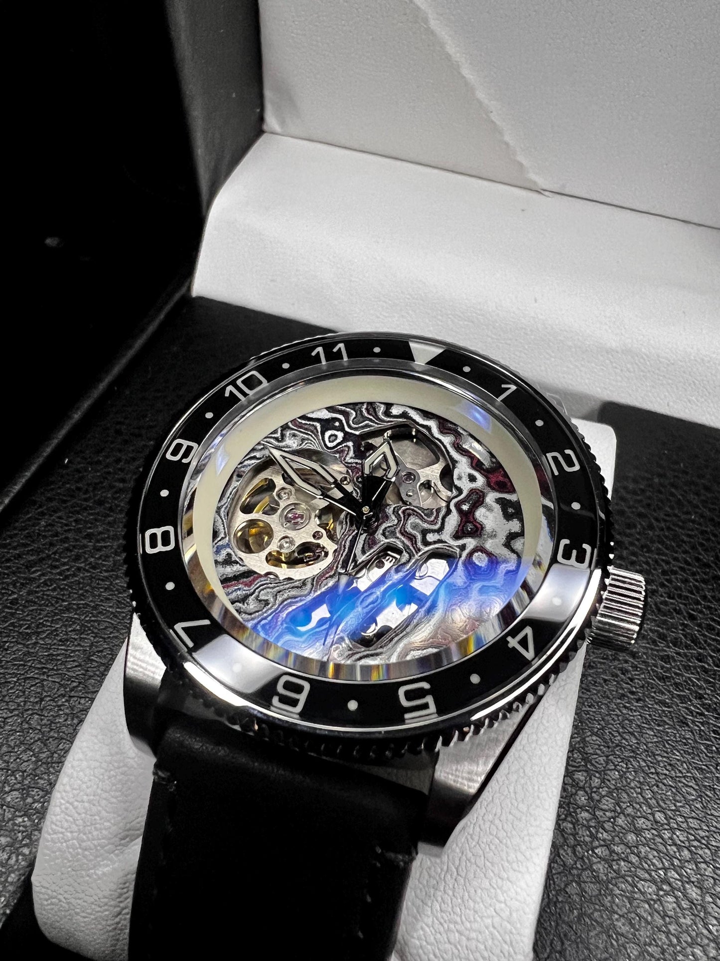 Watch with Skeletonized fordite dial (NH70 powered)