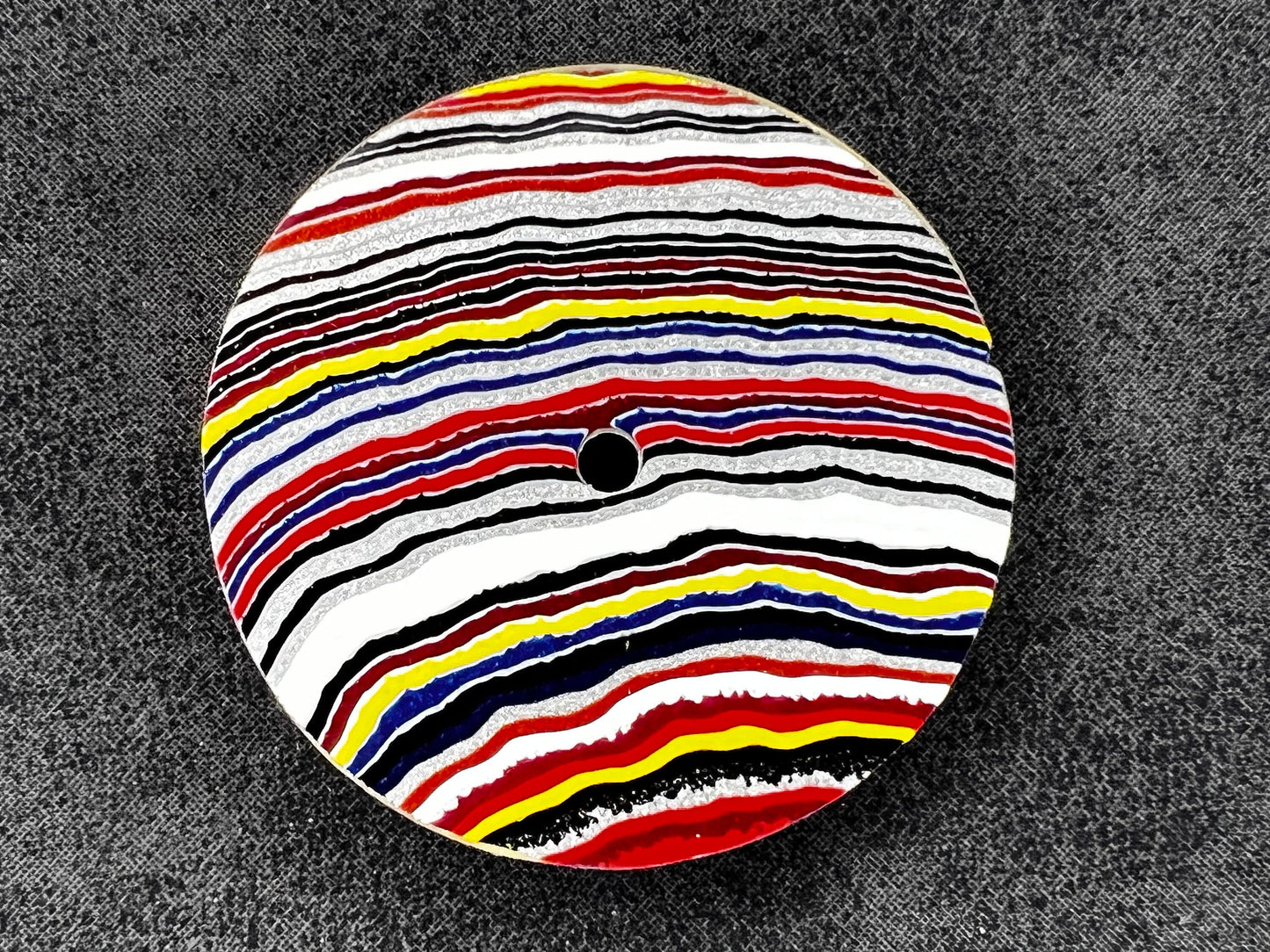 Bright linear fordite NH38 dial