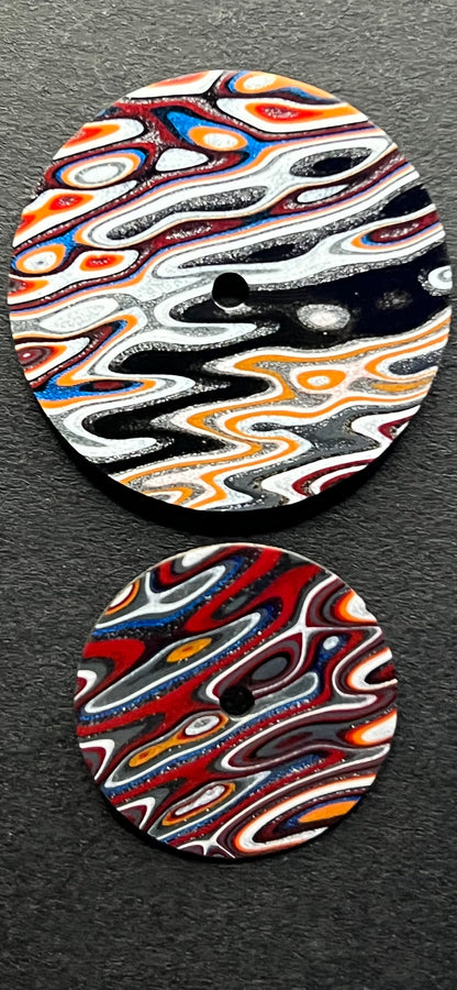 Matching pair of fordite dials for A.H.