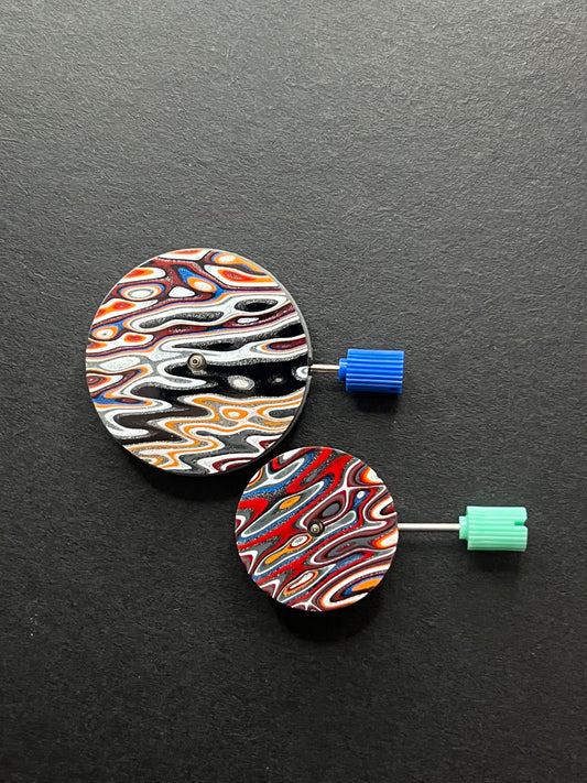 Matching pair of fordite dials for A.H.