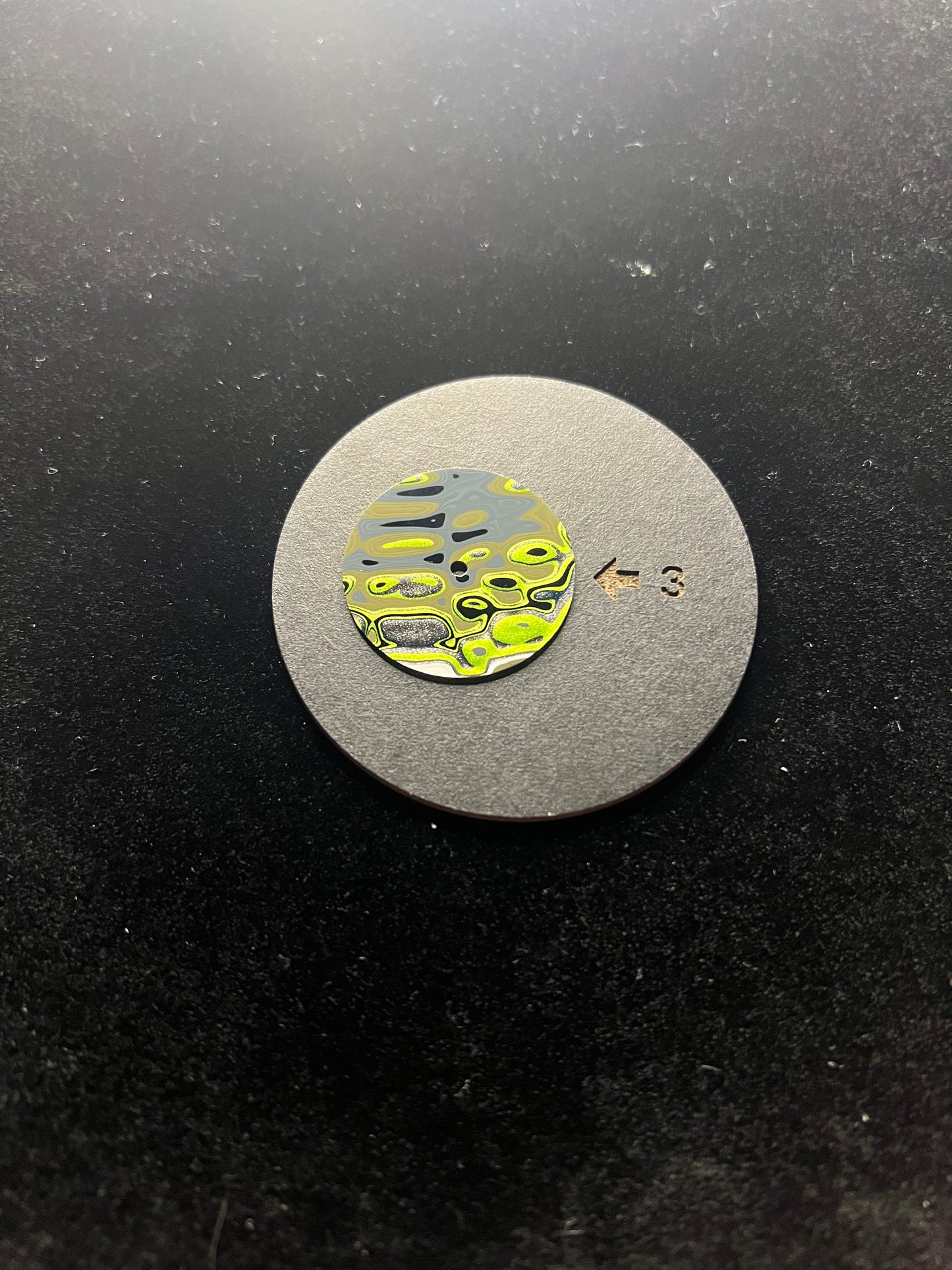 Handmade fordite dial with small defect