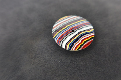 Bright linear fordite NH38 dial