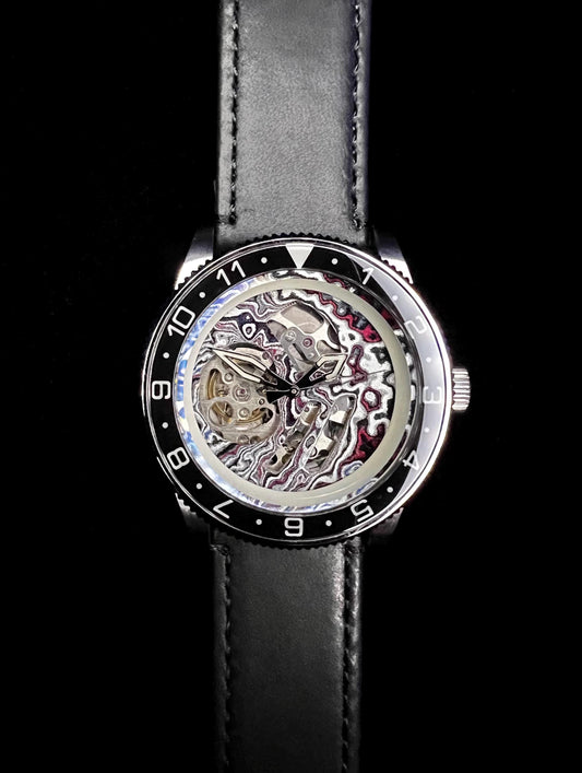 Watch with Skeletonized  fordite dial (NH70 powered)